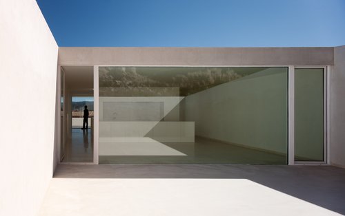 Casa en la Ladera de un Castillo