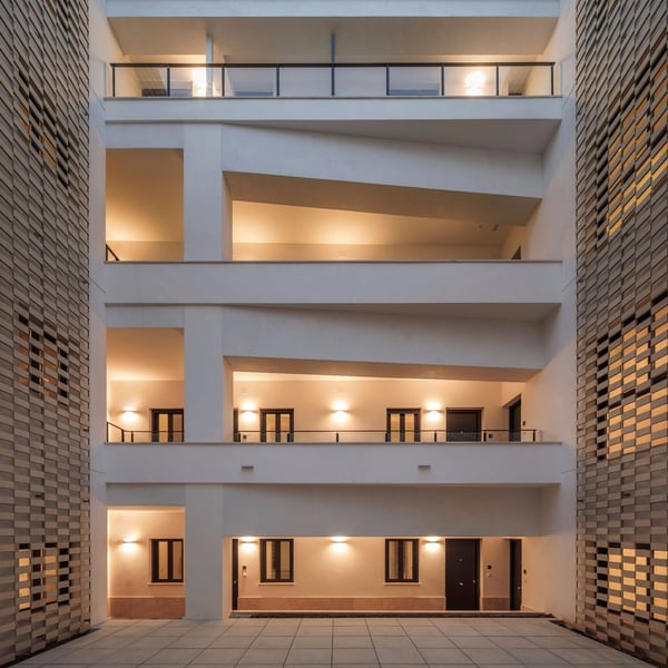 Restoration of a building for eleven tourist apartments and two commercial establishments